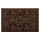 Monogrammed WaterHog 2x3 all-weather doormat in a dark earthy brown leafy design with incredibly durable backing.