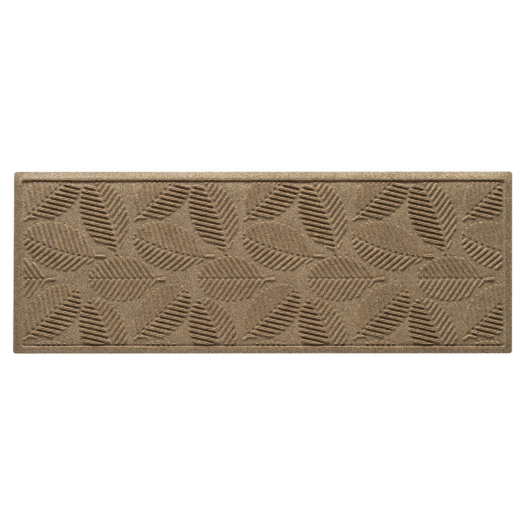 An OG WaterHog 2x5 indoor/outdoor runner in a light tan leafy design, eco-friendly surface, and durable rubber backing.