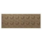 An OG WaterHog 3x8 indoor/outdoor runner in a light tan leafy design, eco-friendly surface, and durable rubber backing.