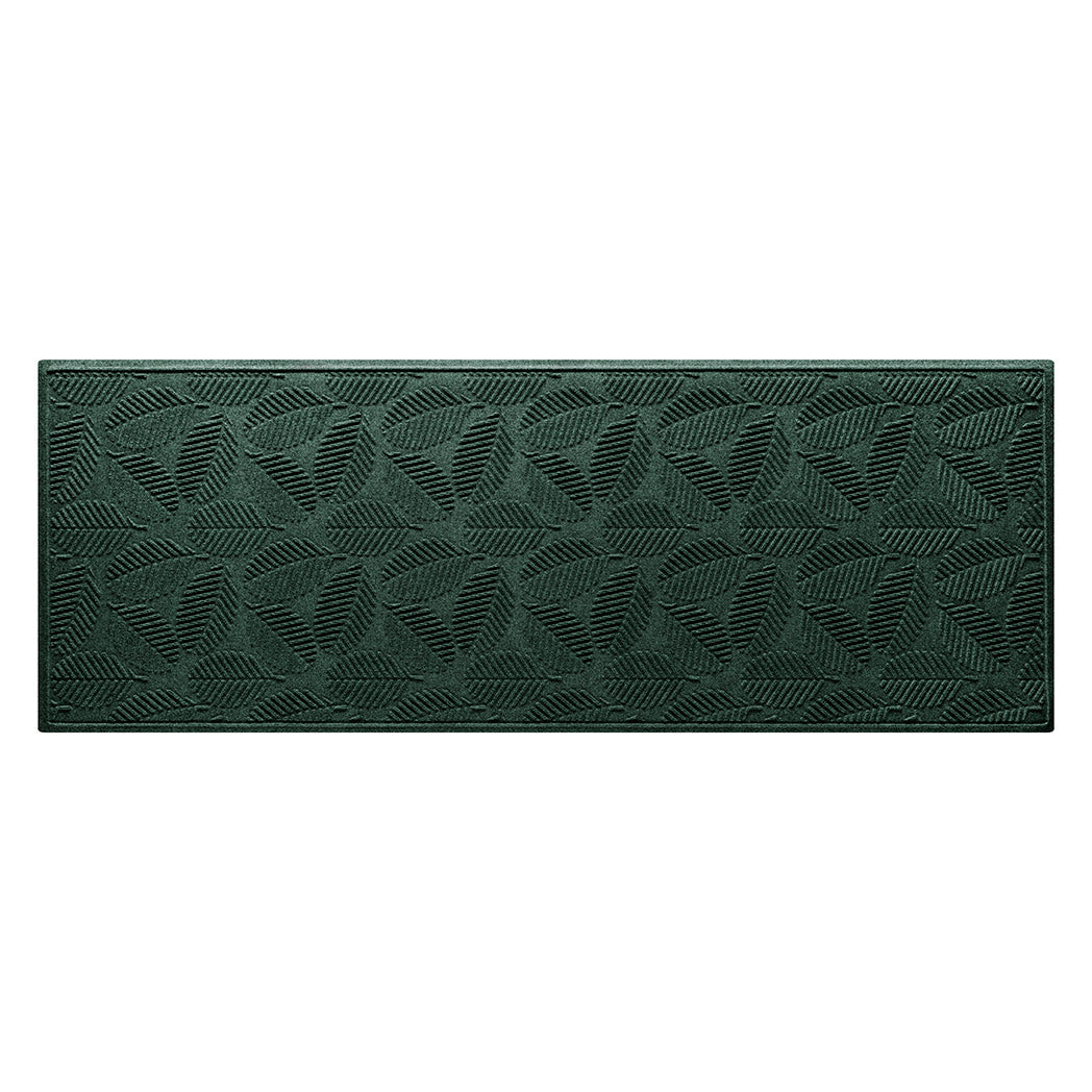 Genuine WaterHog outdoor medium runner with a deep green leafy design, an American-made mat.