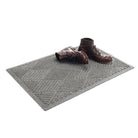 Angled 2x3 WaterHog Diamonds doormat in medium grey with a pair of brown leather boots placed on top.