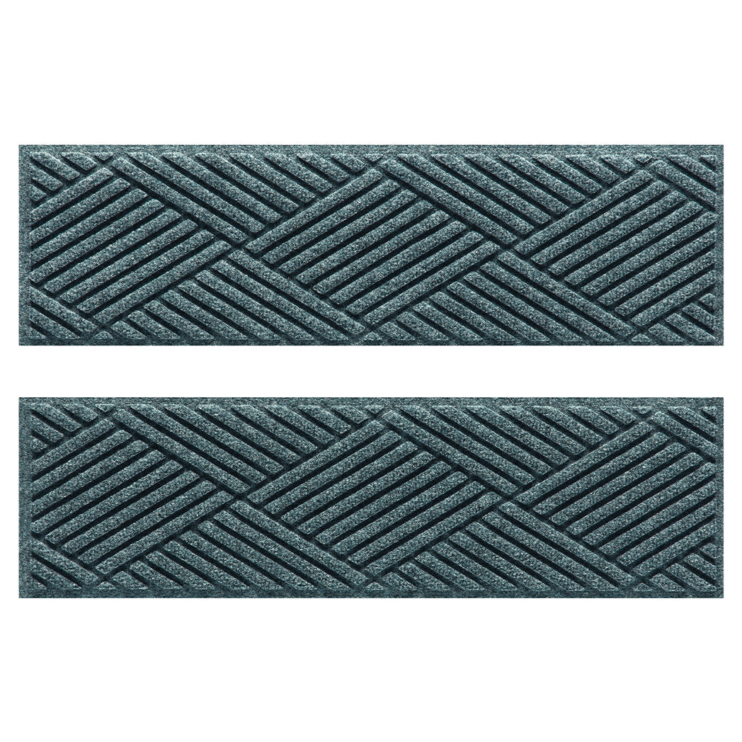 Pair of WaterHog Diamonds fade-resistant stair treads  in a light blue/grey crisscrossing linear, bi-level design.