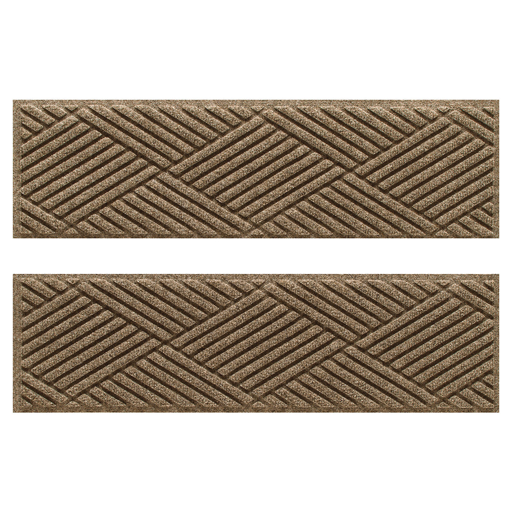 Overhead of a Pair of WaterHog Diamonds indoor/outdoor stair treads in a light tan surface and crisscrossing linear pattern.