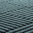 Detail shot of Diamond's eco-friendly surface, made of light blue, grey, and white fibers.