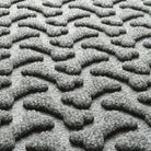 Zoomed in view of Dog Bone's fade-resistant surface creating a light grey, long-lasting mat.