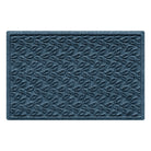 Deep blue 2" x 3" doormat with a repetitive leaf bi-level design