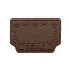 A medium WaterHog Drool Hog personalized bowl mat overhead, in a dark earthy brown surface.