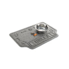 Angled personalized WaterHog Drool Hog bowl mat in medium grey with a water bowl and dog treats for size reference.