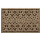 The OG WaterHog medium indoor/outdoor doormat in a light tan color and interlocking elliptical, bi-level design.