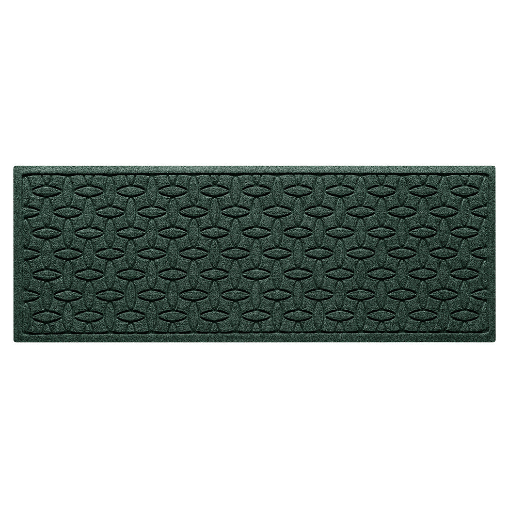 An Ellipse WaterHog small runner with a deep green interlocking elliptical pattern.