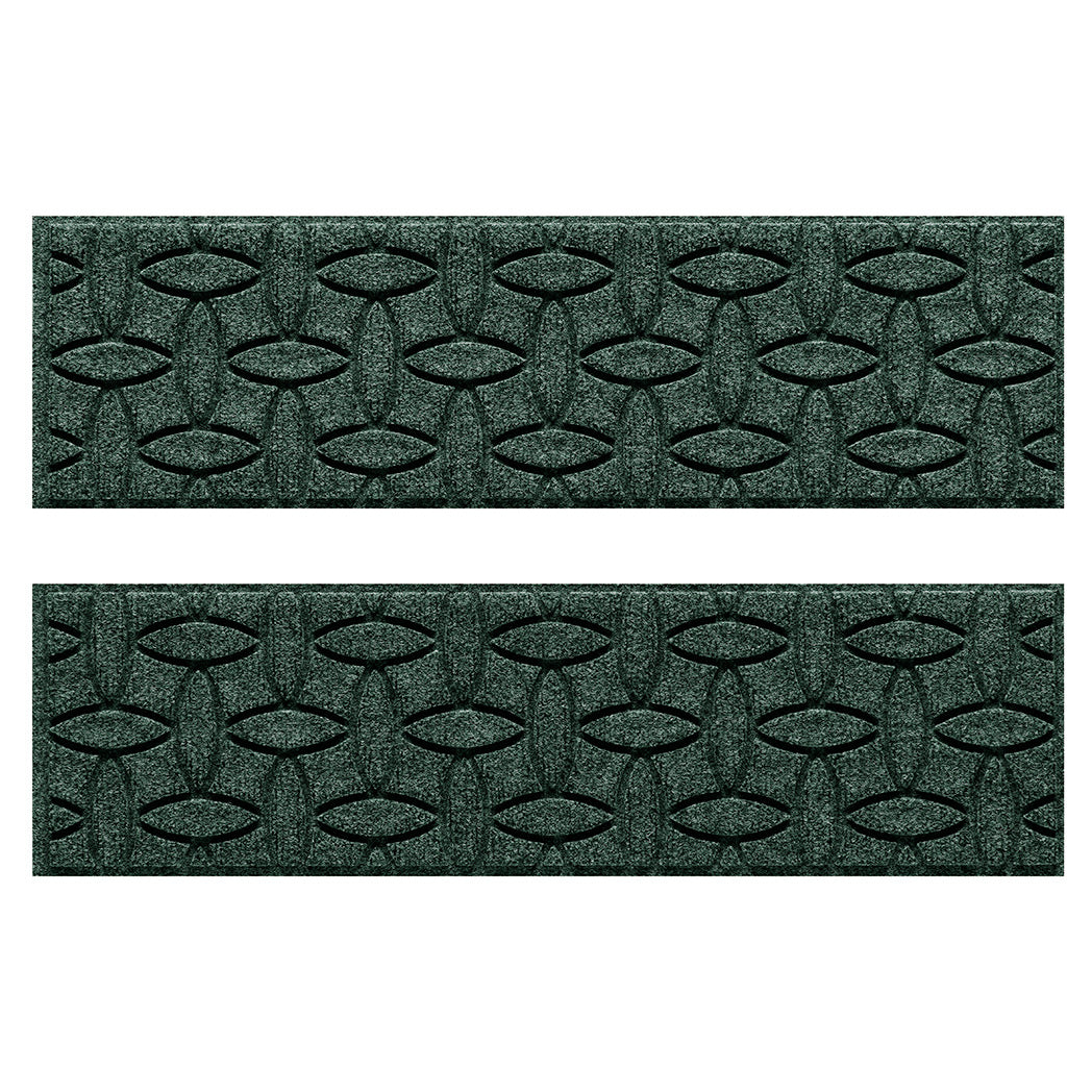 Protective WaterHog indoor/outdoor outdoor stair treads with a deep green interlocking elliptical design; an American-made mat.