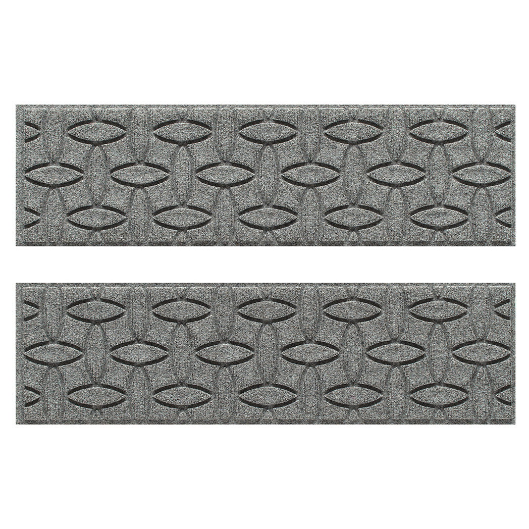 WaterHog indoor/outdoor luxury stair treads in a light grey interlocking elliptical design; an American-made mat.