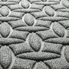 Detail shot of the fade-resistant WaterHog Ellipse surface creating a light grey, durable long-lasting doormat.