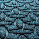 Close-up of the all-weather WaterHog durable surface fibers made of dark and light blues, white and grey strands.