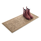 Angled WaterHog Fall Day camel boot tray with a pair of pink rubber boots in the doormat on a white background.