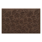 Fall Day WaterHog medium-sized outdoor doormat in a dark earthy brown surface and fallen leaves pattern.