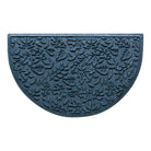 Overhead of a half-round Fall Day doormat with a relaxed blue fallen leaves pattern.