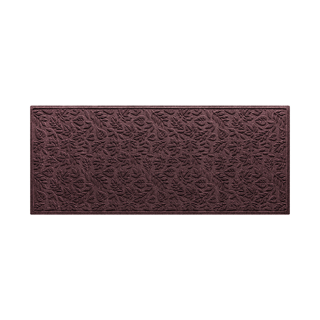 A WaterHog 3x7 outdoor all-weather runner in a deep wine red surface and fallen leaves pattern.