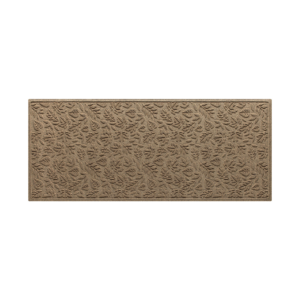 An OG WaterHog Fall Day indoor/outdoor medium runner in a light tan, eco-friendly surface.