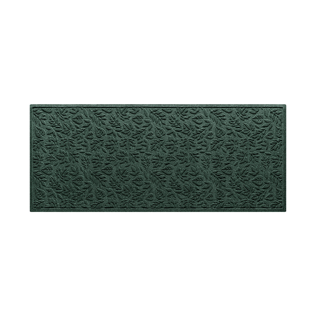 Genuine WaterHog Fall Day outdoor medium runner with a deep green surface and fallen leaves pattern.