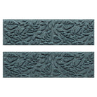 Pair of WaterHog Fall Day fade-resistant stair treads  in a light blue/grey fallen leaves, bi-level design.