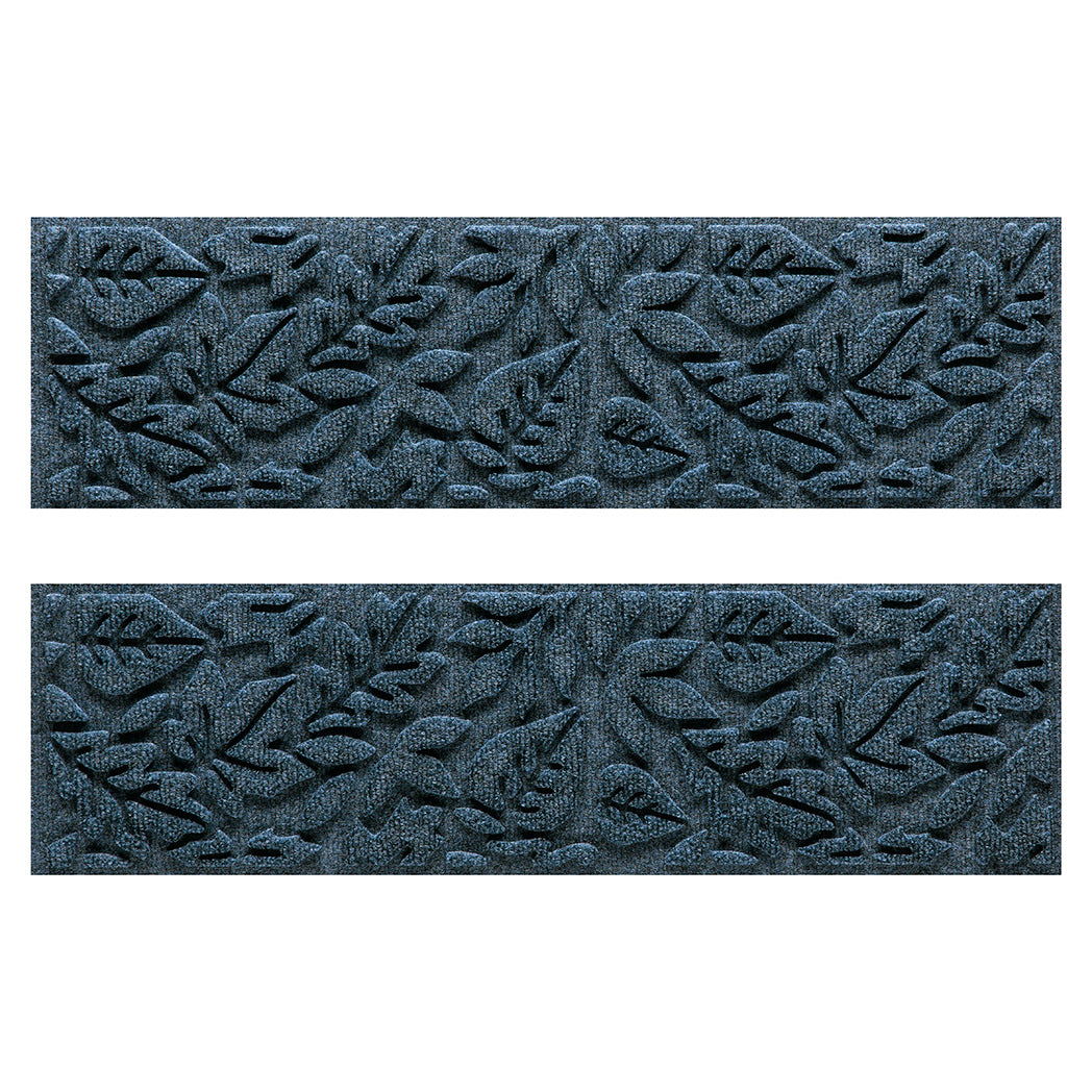 Quality WaterHog outdoor stair treads with a relaxed blue surface and fallen leaves pattern.