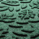 Close-up of the stain-resistant WaterHog surface made of green, white, and grey creating a modern design.