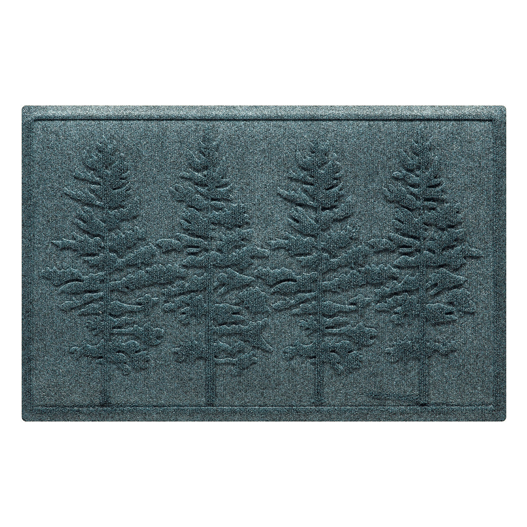 A medium, 2x3, WaterHog front doormat in a blue/grey color with a fir tree design.