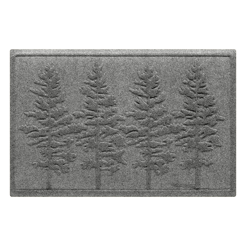 A medium, 2x3, WaterHog front doormat in a light grey color with a fir tree design.