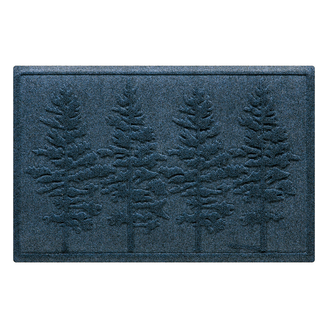 A medium, 2x3, WaterHog front doormat in a dark blue color with a fir tree design.