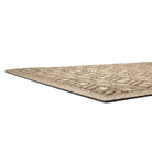 A close-up shot of the High-Rise WaterHog doormat's low-profile, and durable rubber backing in the color camel.