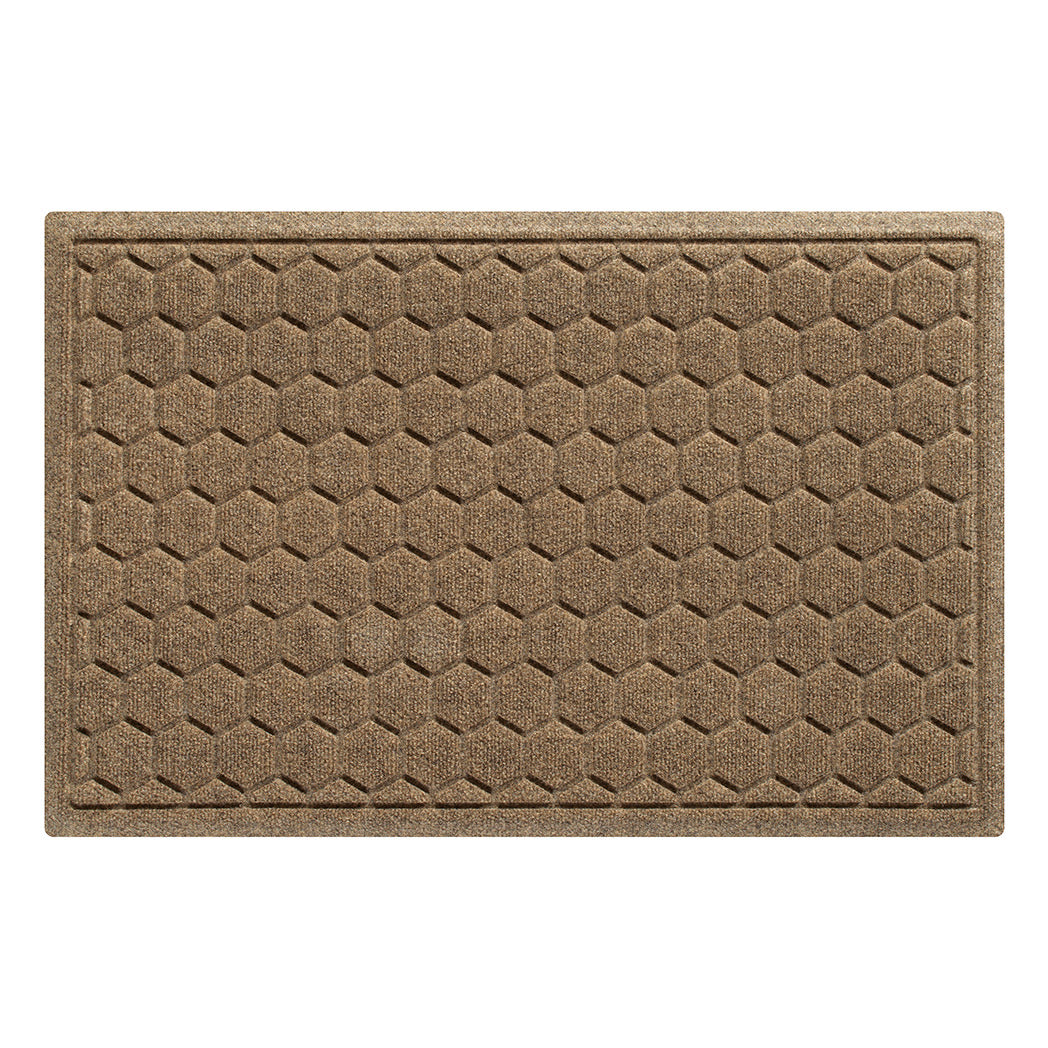 A WaterHog Honeycomb outdoor doormat in tan, featuring a hexagonal pattern displayed on a white background.