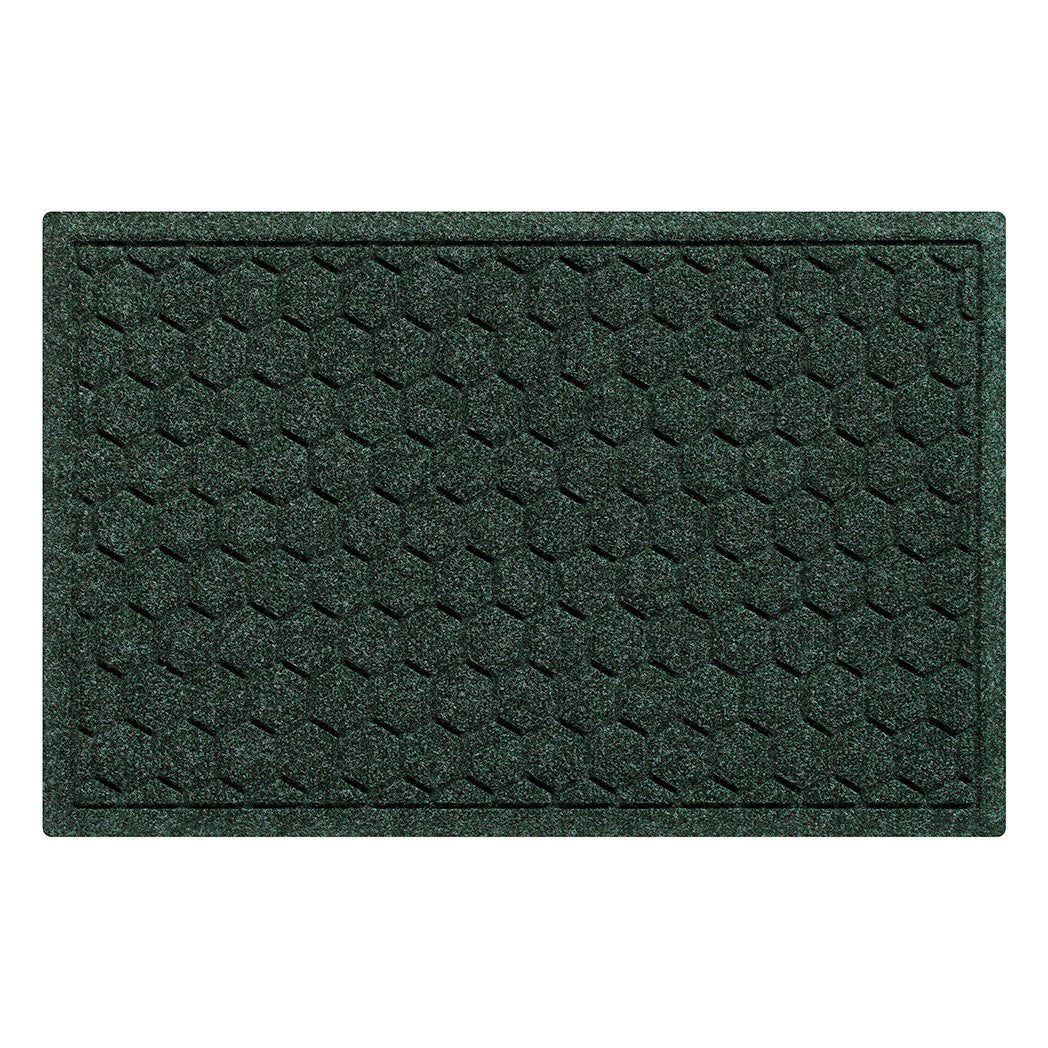 A WaterHog Honeycomb durable doormat in deep green, featuring a hexagonal pattern displayed on a white background.