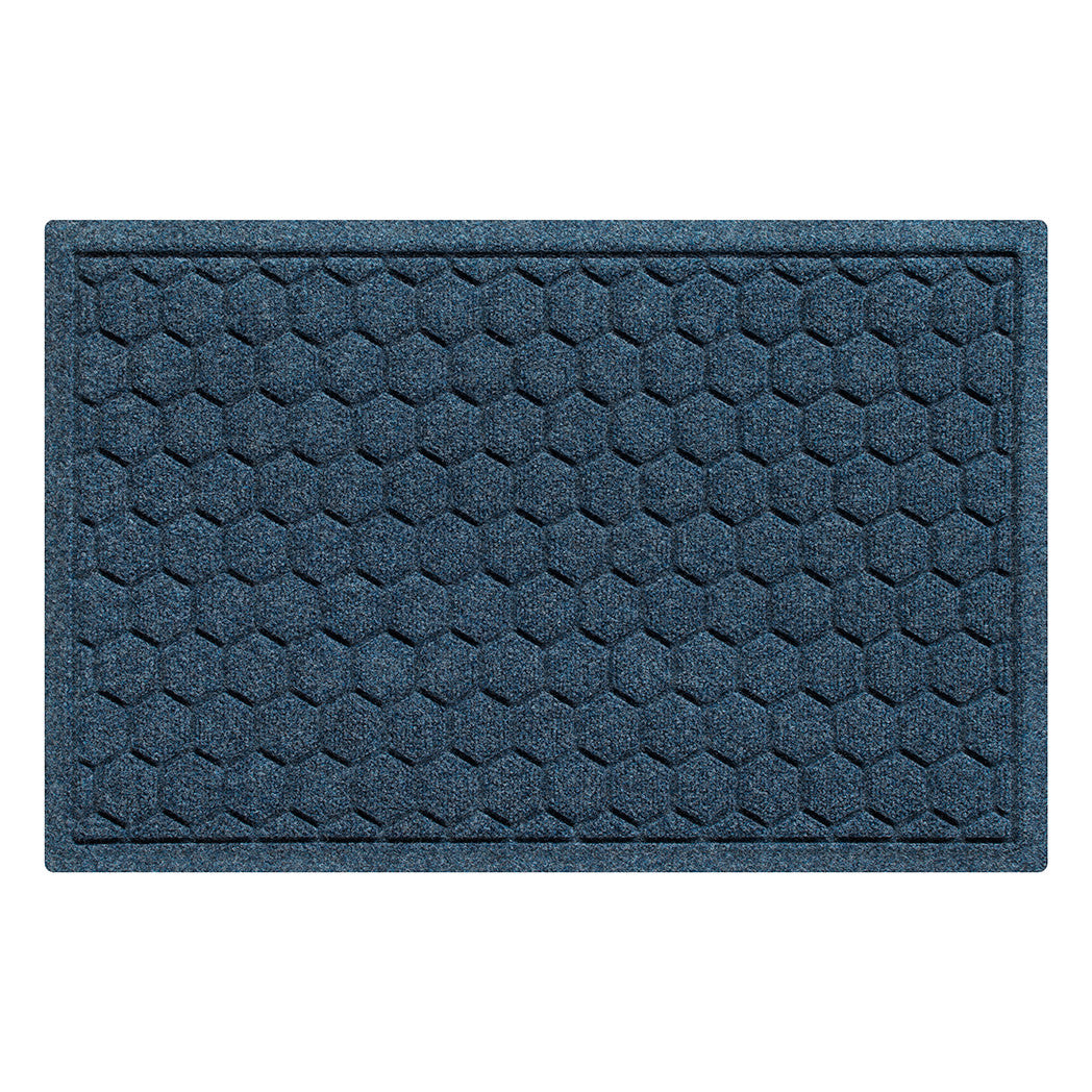 A WaterHog Honeycomb all-weather doormat in navy blue color, featuring a hexagonal pattern displayed on a white background.