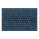 A WaterHog Honeycomb all-weather doormat in navy blue color, featuring a hexagonal pattern displayed on a white background.