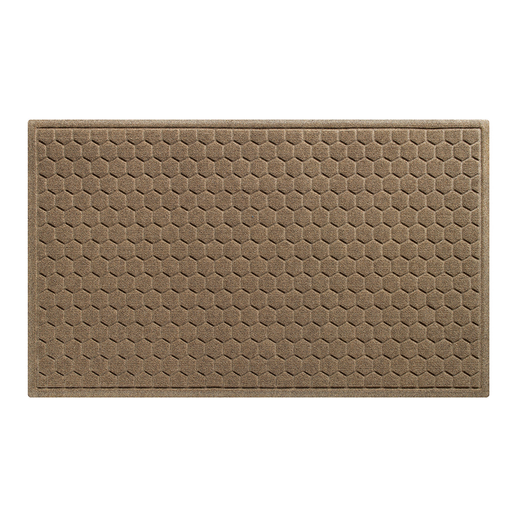 A large 3x5 WaterHog Honeycomb outdoor doormat in tan, featuring a hexagonal pattern displayed on a white background.