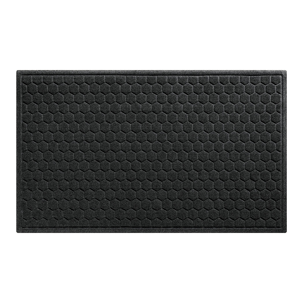 "A large 3x5 WaterHog Honeycomb all-weather doormat in dark grey, featuring a hexagonal pattern displayed on a white background