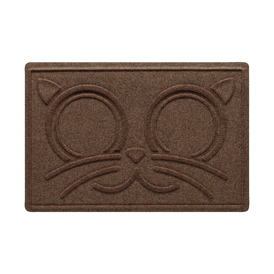 A large WaterHog Kitty Face bowl mat overhead, with a dark earthy brown surface.