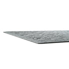 The side-profile shot of WaterHog Phoenix doormat in grey, showcasing its low-profile properties of the mat.