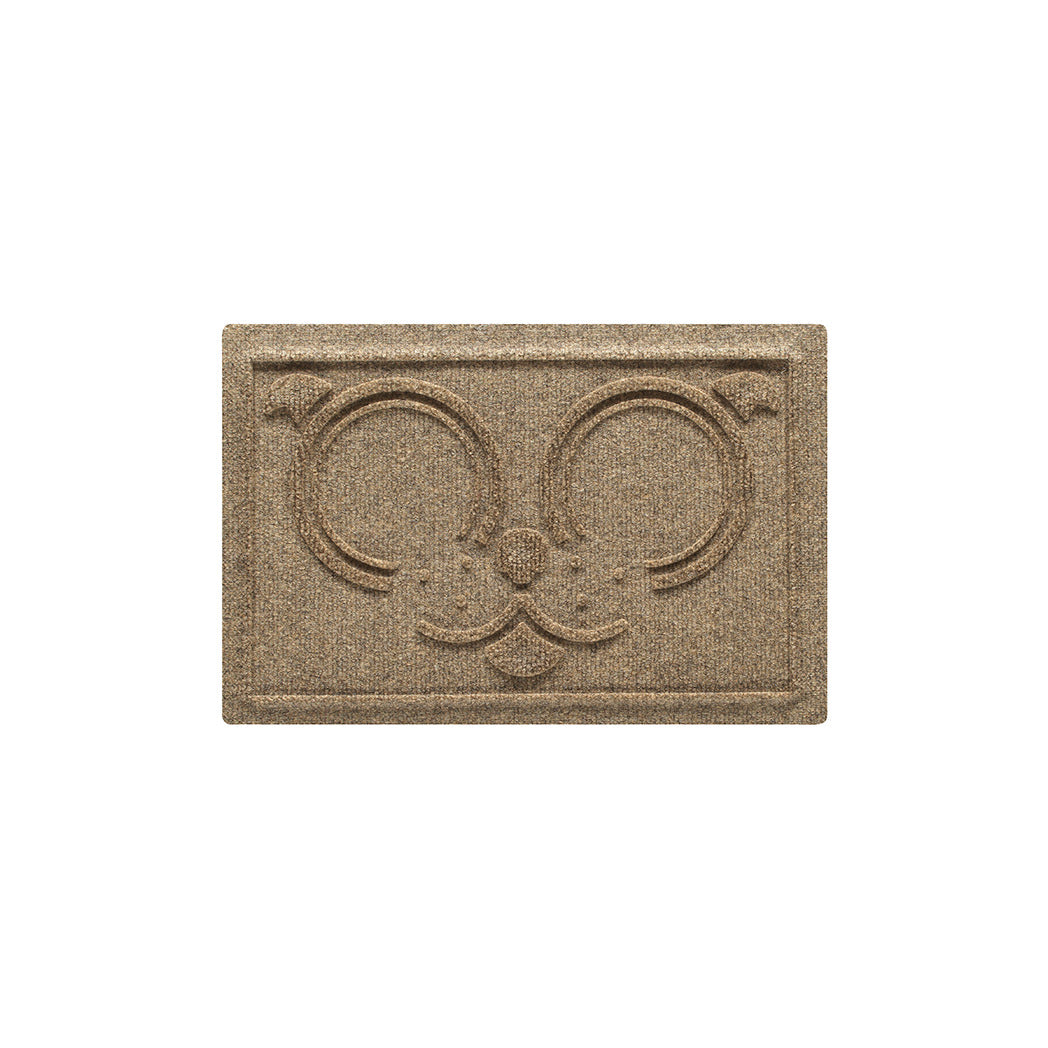 A small WaterHog Puppy Face bowl mat overhead, in a light tan color and fast-drying surface.