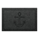 WaterHog Ship's Anchor all-weather doormat in a dark grey, featuring a raised anchor design in the center with a decorative rope like border, displayed on a white background. 