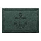 WaterHog Ship's Anchor all-weather doormat in a deep green, featuring a raised anchor design in the center with a decorative rope like border, displayed on a white background. 