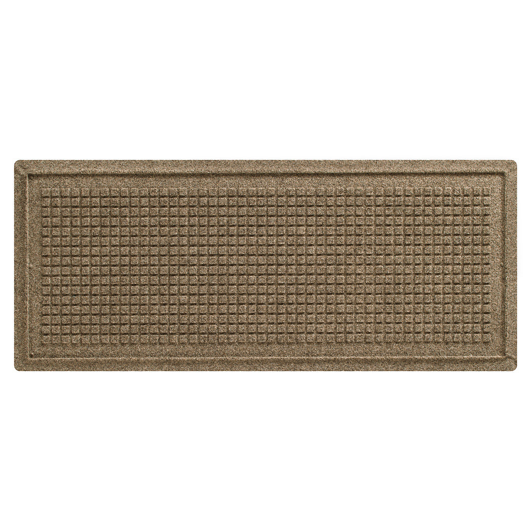 An authenitc WaterHog  Squares boot tray mat in a light tan bi-level surface with a uniform grid pattern.
