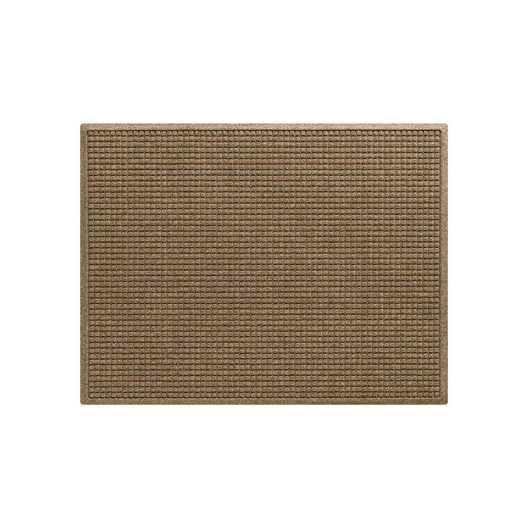 An authentic WaterHog squares doormat in 3x4 size, in a light tan color with a grid-like pattern on an eco-friendly PET surface and durable rubber backing.