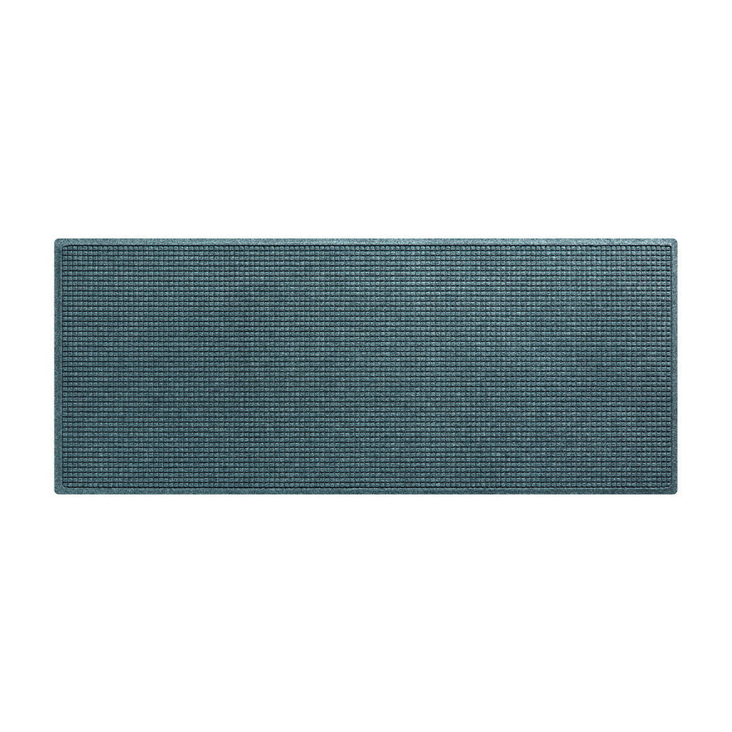 WaterHog Squares runner in a 3x6 size, with a light blue/grey eco-friendly surface, that's backed by durable rubber backing.