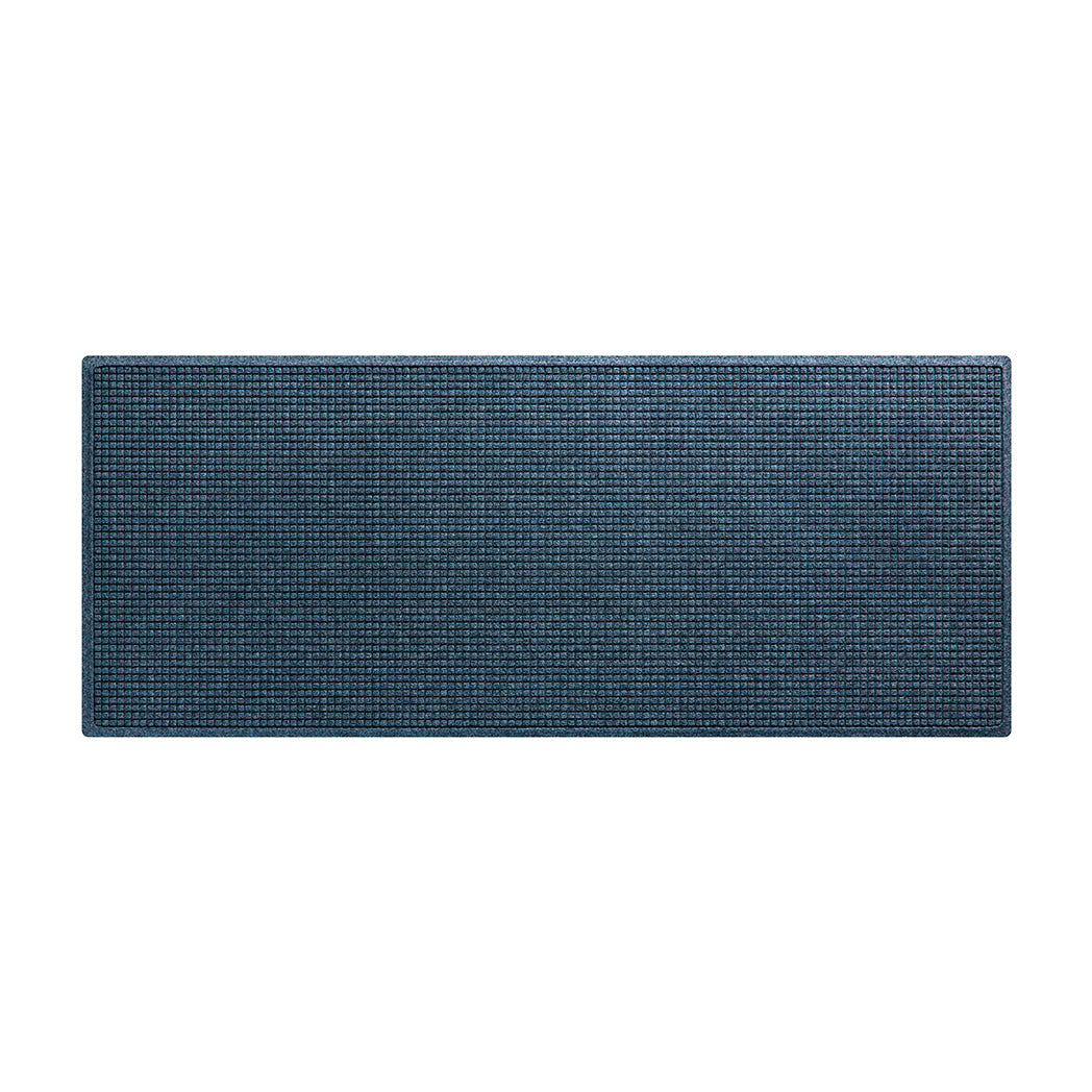 A classic WaterHog Squares runner in a medium blue color, made from eco-friendly fibers and backed by durable rubber, shown on a white background.