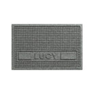 WaterHog Squares medium-sized personalized pet bowl mat in a light grey, fast-drying surface with the pet name LUCY in all caps on the lower half of the mat.