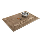 Angled WaterHog Squares personalized mat in 2x3 camel mat with a water dish and two dog treats thrown on top, which doesn't take up but half of the mat.