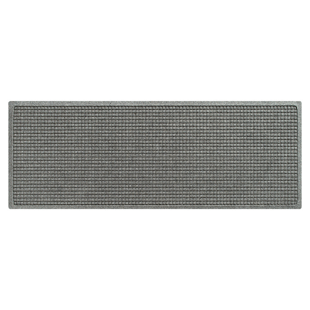 Traditional WaterHog medium-sized runner mat in a light grey squares fade-resistant patterned surface.