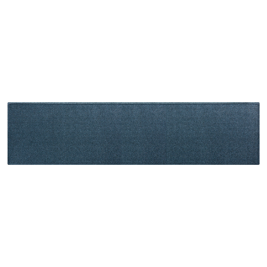 Overhead of a super durable XL Squares WaterHog indoor/outdoor runner mat with a classic navy blue fade-resistant PET surface.